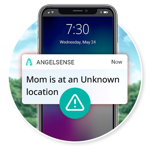 A smartphone notification reading 'Mom is at an Unknown location'